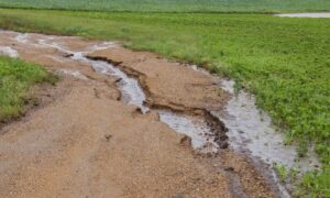 Floodwater erosion reshaping rural land highlighting the need for a post-storm topographic survey