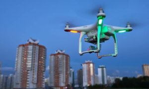 Real time aerial response drone over city - ALTA SURVEY Arizona Drone flying over a city to support real-time aerial response and lidar mapping for faster land and infrastructure decisions