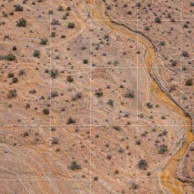 Aerial view showing desert terrain and drainage patterns revealed through drone mapping analysis