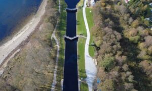 Aerial view of a canal and surrounding banks assessed through aerial surveying for rehabilitation planning