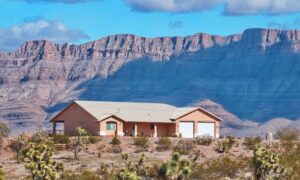 Rural home mortgage survey private well - ALTA SURVEY Arizona Rural Arizona home surrounded by desert terrain and mountains, representing a property that may require a mortgage survey before closing